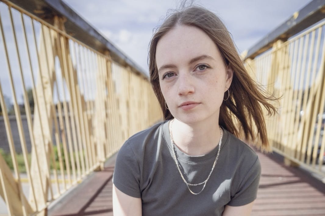 Portrait of Esme Bridie on a bridge