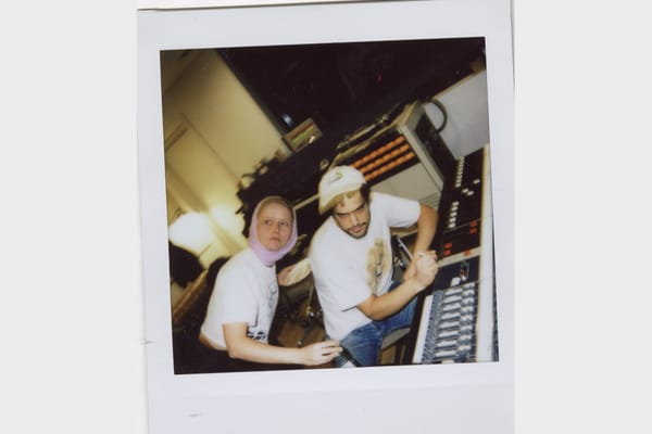 Polaroid of strongboi in the studio