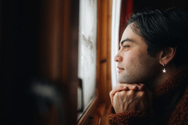 Photo of Indonesia-born, singer/songwriter Hilang child, now calling London, UK his home. The photo shows the artist pensive 